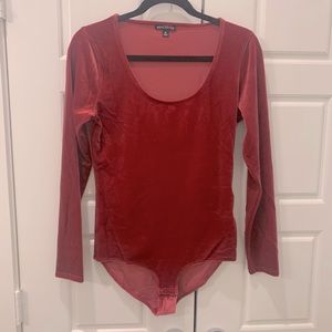 Maroon velvet body suit.